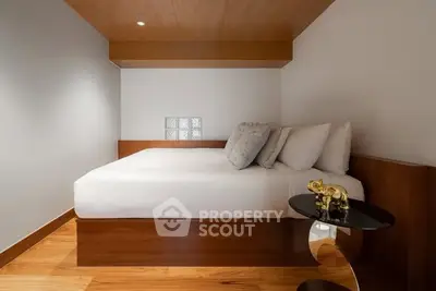Modern bedroom with sleek wooden design and cozy ambiance