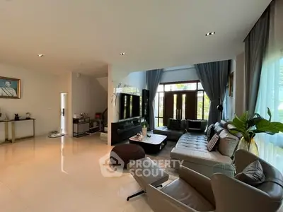 Spacious modern living room with elegant decor and natural light