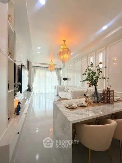 Luxurious modern living room with elegant chandeliers and open layout