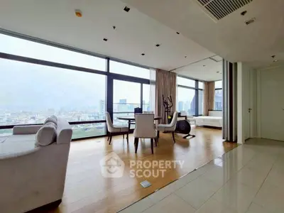 Luxurious living room with panoramic city views and elegant furnishings