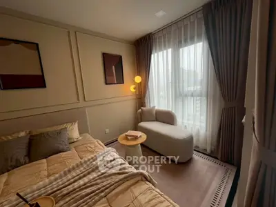 Cozy bedroom with elegant decor and natural light