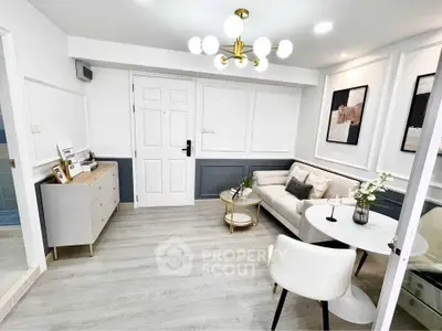 Modern living room with chic decor and elegant lighting