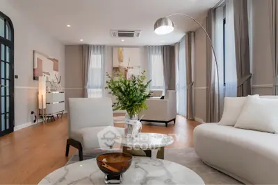 Luxurious modern living room with elegant decor and natural light
