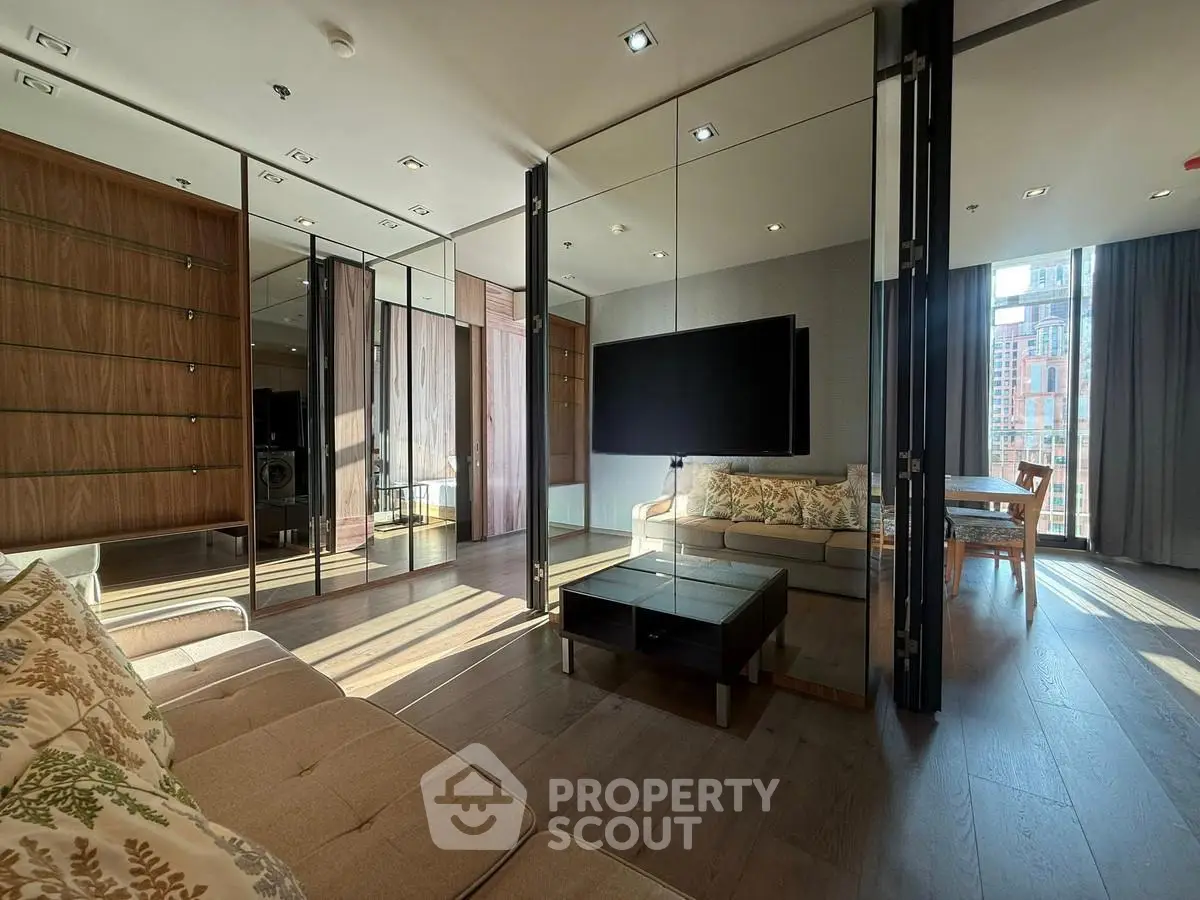 Luxurious modern living room with floor-to-ceiling windows and elegant decor