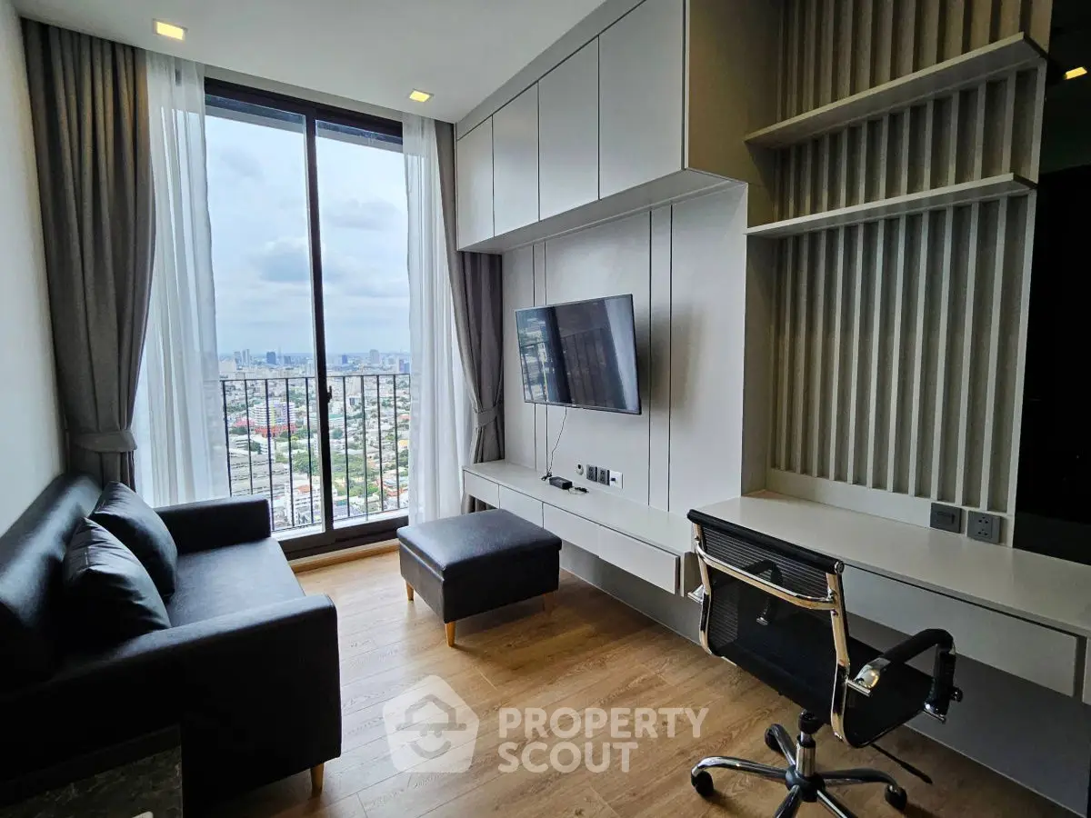Modern living room with city view, sleek furniture, and wall-mounted TV in high-rise apartment.