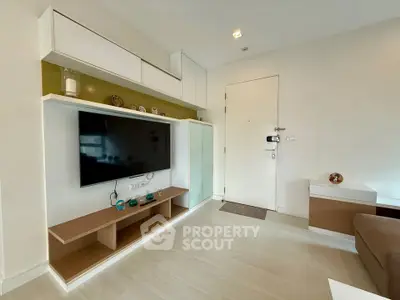 Modern living room with sleek TV unit and minimalist decor