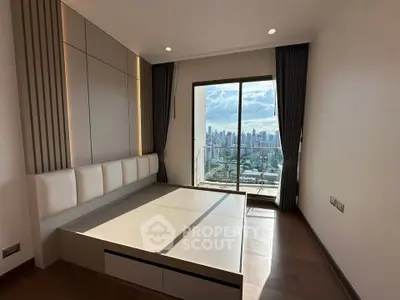 Modern bedroom with stunning city view and large windows in high-rise apartment