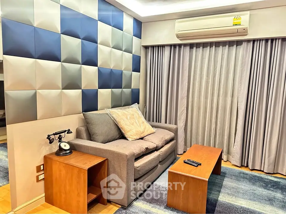 Modern living room with stylish 3D wall panels and cozy furniture