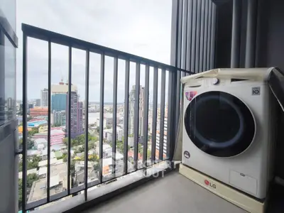 High-rise balcony with city view and modern washing machine