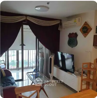 Cozy living room with Route 66 decor and modern furnishings