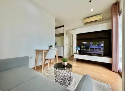 Modern living room with sleek furniture and natural light