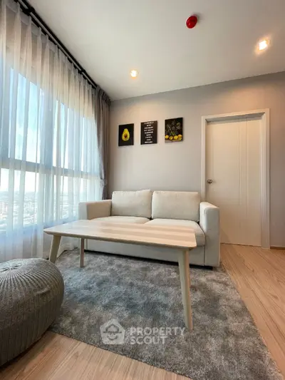Modern living room with cozy sofa and stylish decor