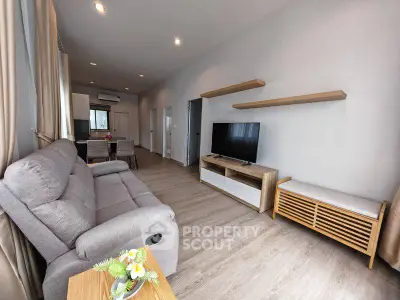 Modern living room with sleek furniture and open layout, perfect for relaxation and entertainment.