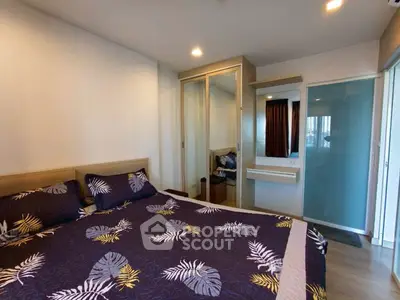 Modern bedroom with stylish decor and ample natural light