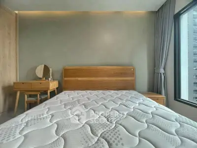 Modern bedroom with wooden furniture and large window view