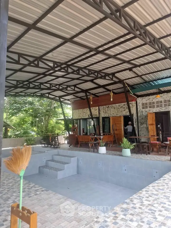 Spacious outdoor patio with modern design and garden view