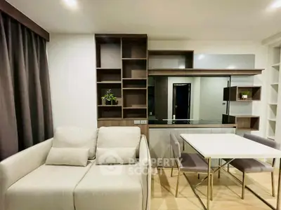 Modern living room with sleek furniture and built-in shelving
