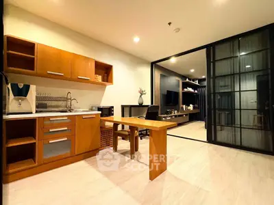 Modern kitchen with wooden cabinets and open layout in stylish apartment