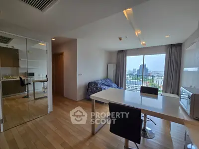 Spacious modern living room with city view and open layout kitchen
