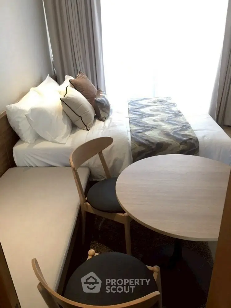 Cozy bedroom with modern decor and natural light