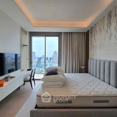 Luxurious bedroom with city view, modern decor, and elegant furnishings in high-rise apartment.