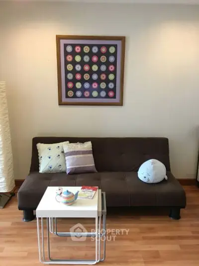 Cozy living room with modern decor and comfortable seating