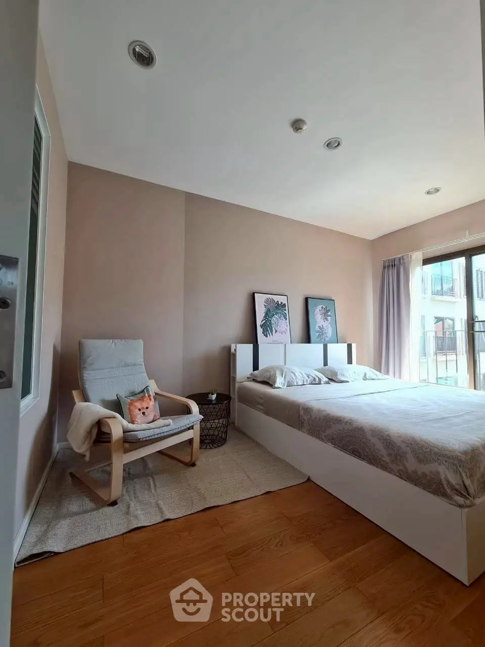 Cozy bedroom with modern decor and natural light