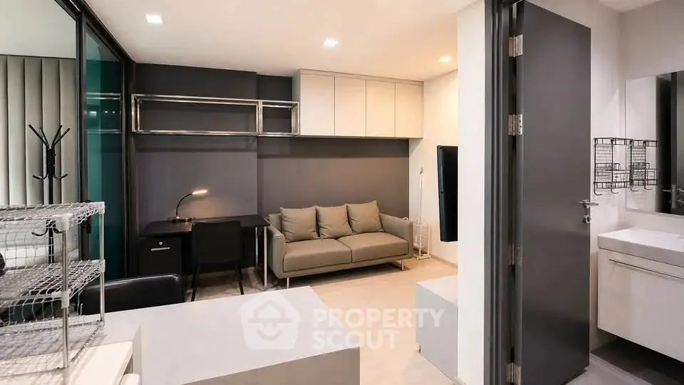 Modern studio apartment with sleek design and compact living space