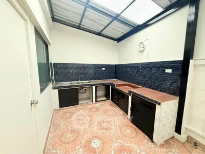 Spacious kitchen with modern design and ample natural light