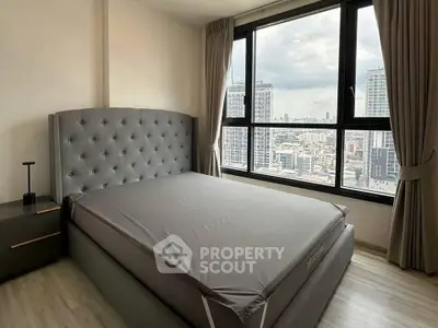 Modern bedroom with city view and elegant decor