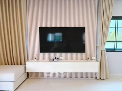 Modern living room with sleek TV setup and elegant decor