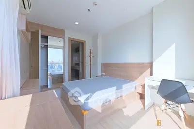 Bright modern bedroom with minimalist design and ample natural light