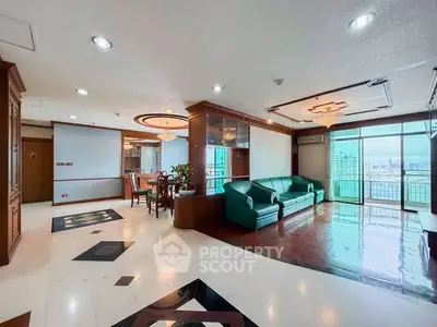 Spacious living room with panoramic city view and elegant decor
