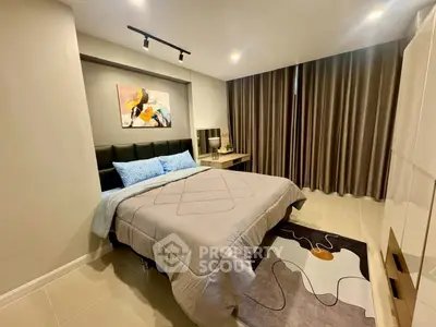 Modern bedroom with stylish decor and cozy ambiance in a contemporary apartment.