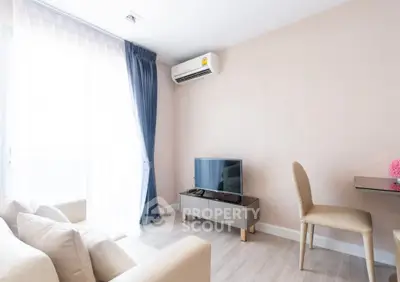 Bright modern living room with air conditioning and stylish furniture