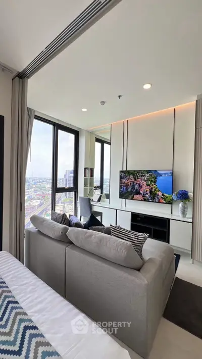 Modern living room with panoramic city view and stylish decor