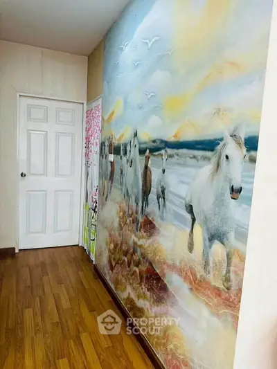 Charming hallway with artistic horse mural and wooden flooring