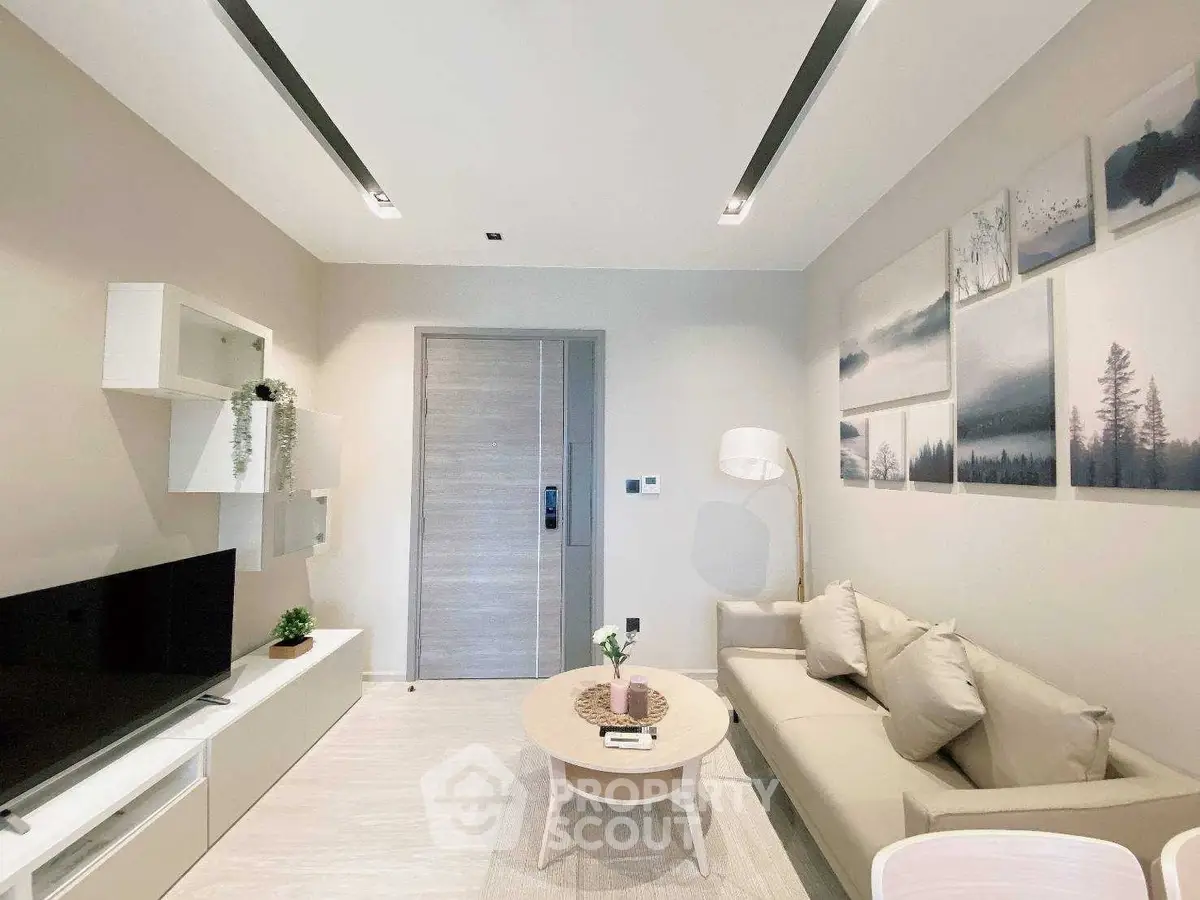 Modern living room with sleek furniture and stylish decor, perfect for contemporary living.