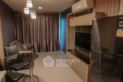 Modern living room with stylish furniture and air conditioning in a cozy apartment.