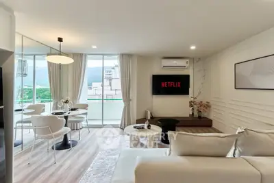 Modern living room with mountain view and stylish decor