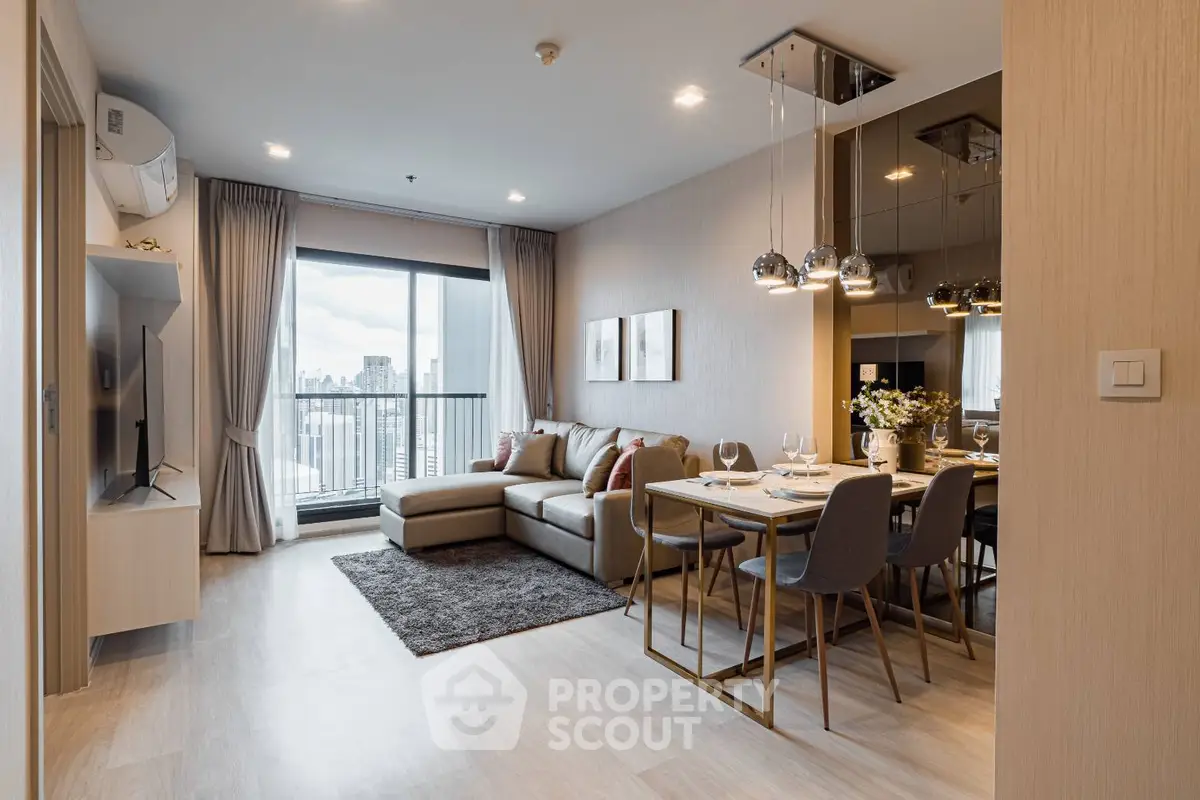 Modern living room with elegant dining area and city view balcony in luxury apartment.