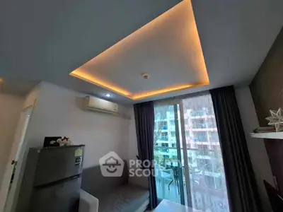 Modern living room with ambient lighting and balcony view