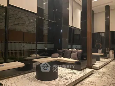 Luxurious modern lobby with marble floors and stylish seating