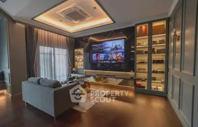 Luxurious living room with modern entertainment center and elegant lighting