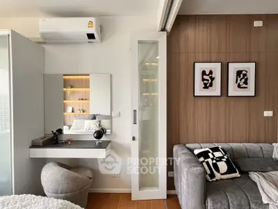 Modern bedroom with stylish decor and cozy seating area