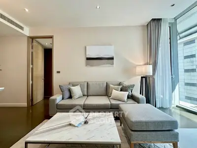 Modern living room with stylish sofa and natural light