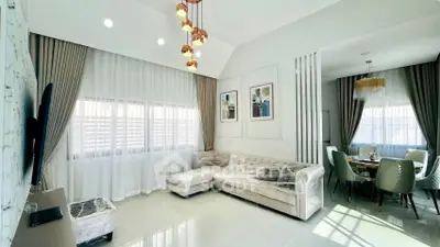 Spacious modern living room with elegant decor and dining area