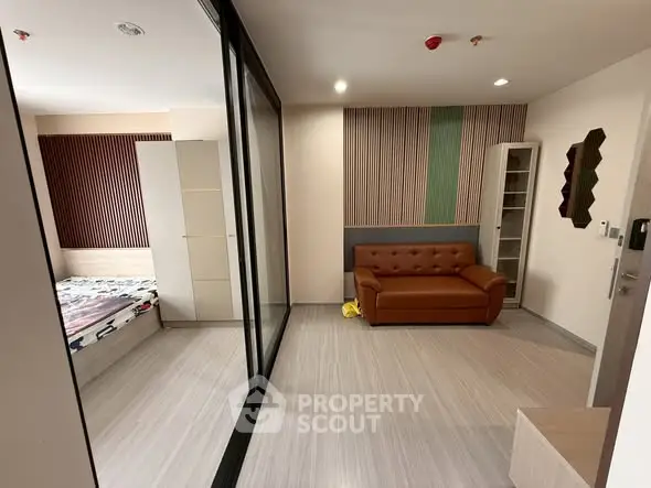 Modern apartment interior with stylish living room and cozy bedroom