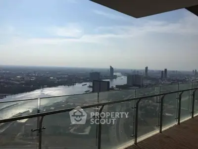 Stunning high-rise balcony with panoramic city and river views