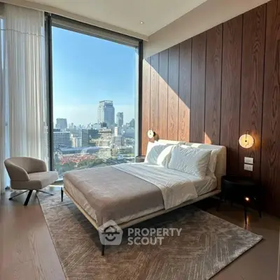 Luxurious bedroom with stunning city view and modern decor